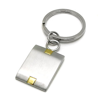 "A key chain is not only used to help you find your key, but it is also an accessory to complete your appearance. This stainless steel key ring will give you a modern look, plus the two squares of 18k gold on the surface will create a special accent to it."
